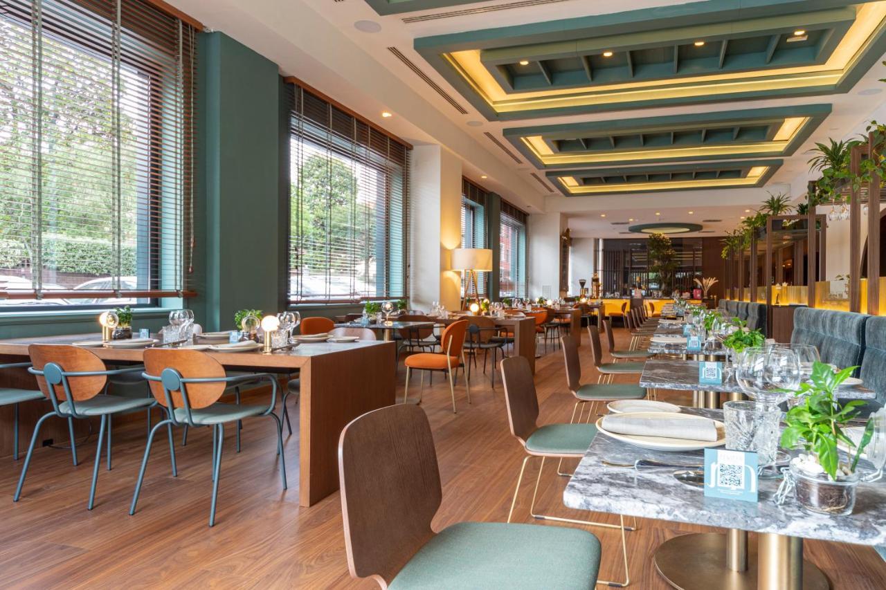 Melia Milano Hotel Exterior photo Restaurant