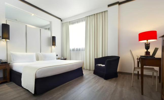 Melia Milano Hotel Exterior photo A room at the hotel